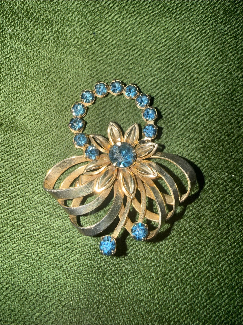 Gold-Tone Floral Brooch with Blue Crystals